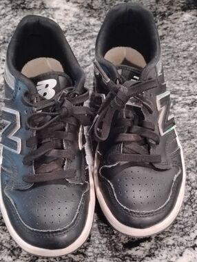 New Balance Black and White Lace-Up Sneakers